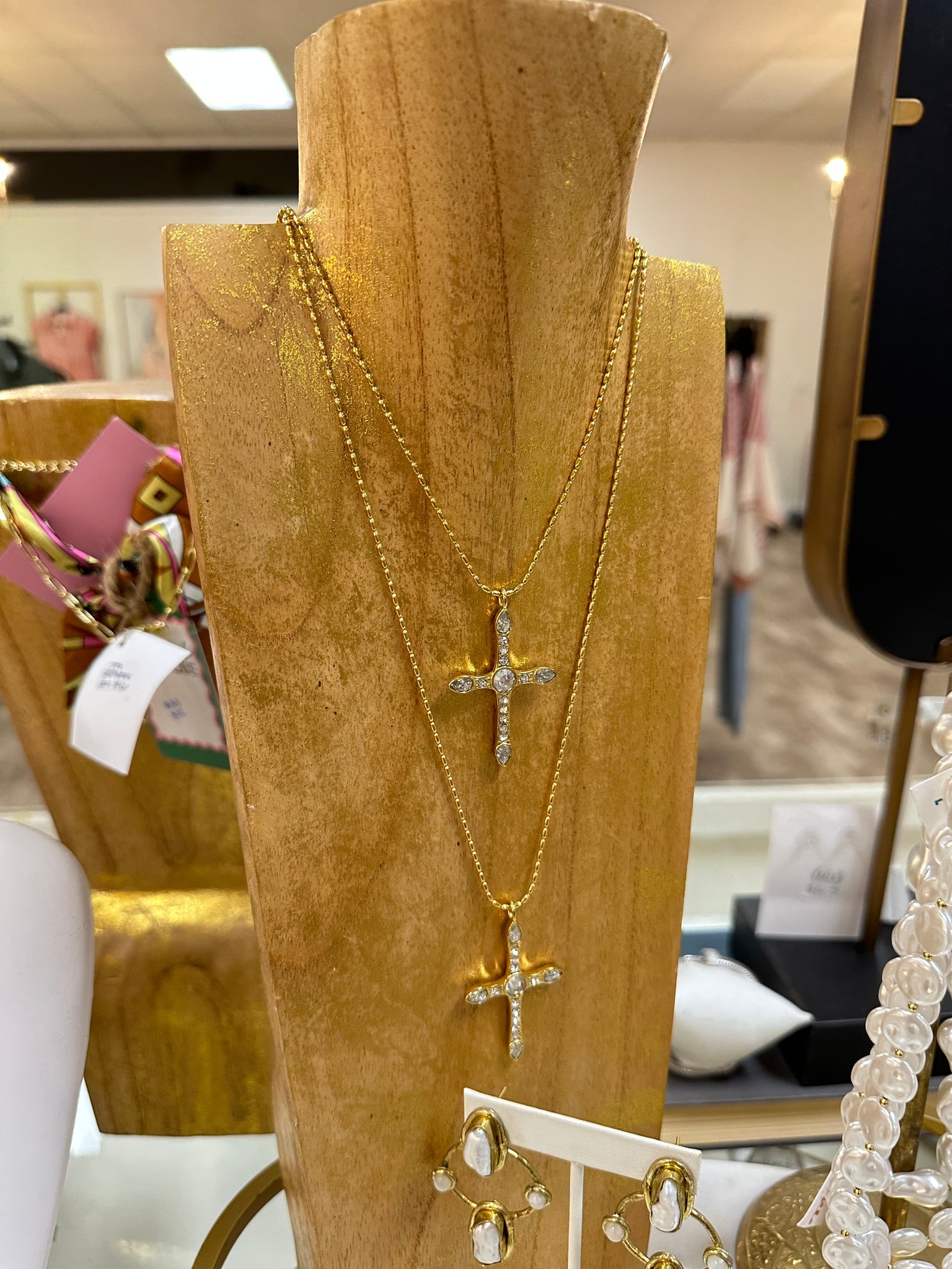 triple play cross necklace