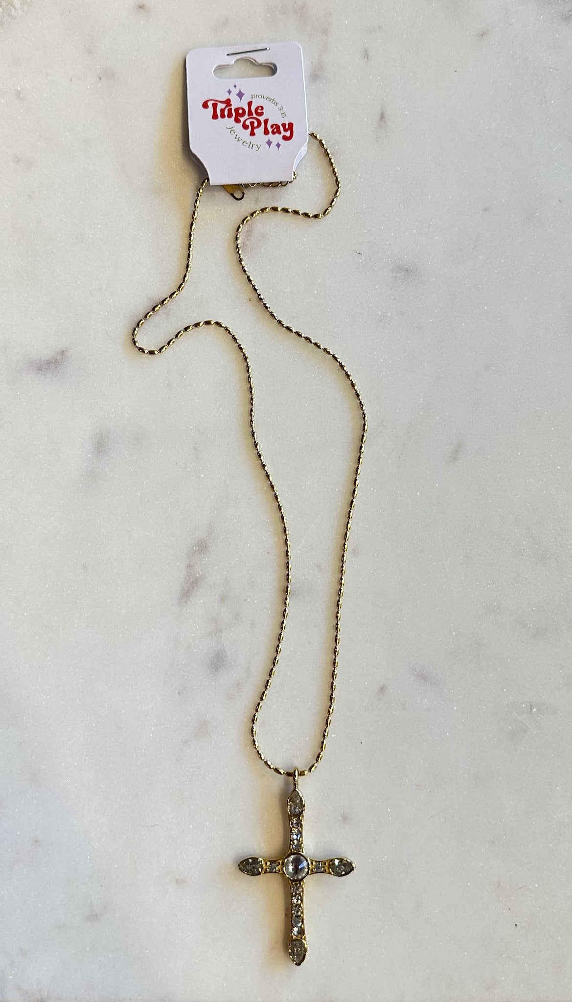 triple play cross necklace