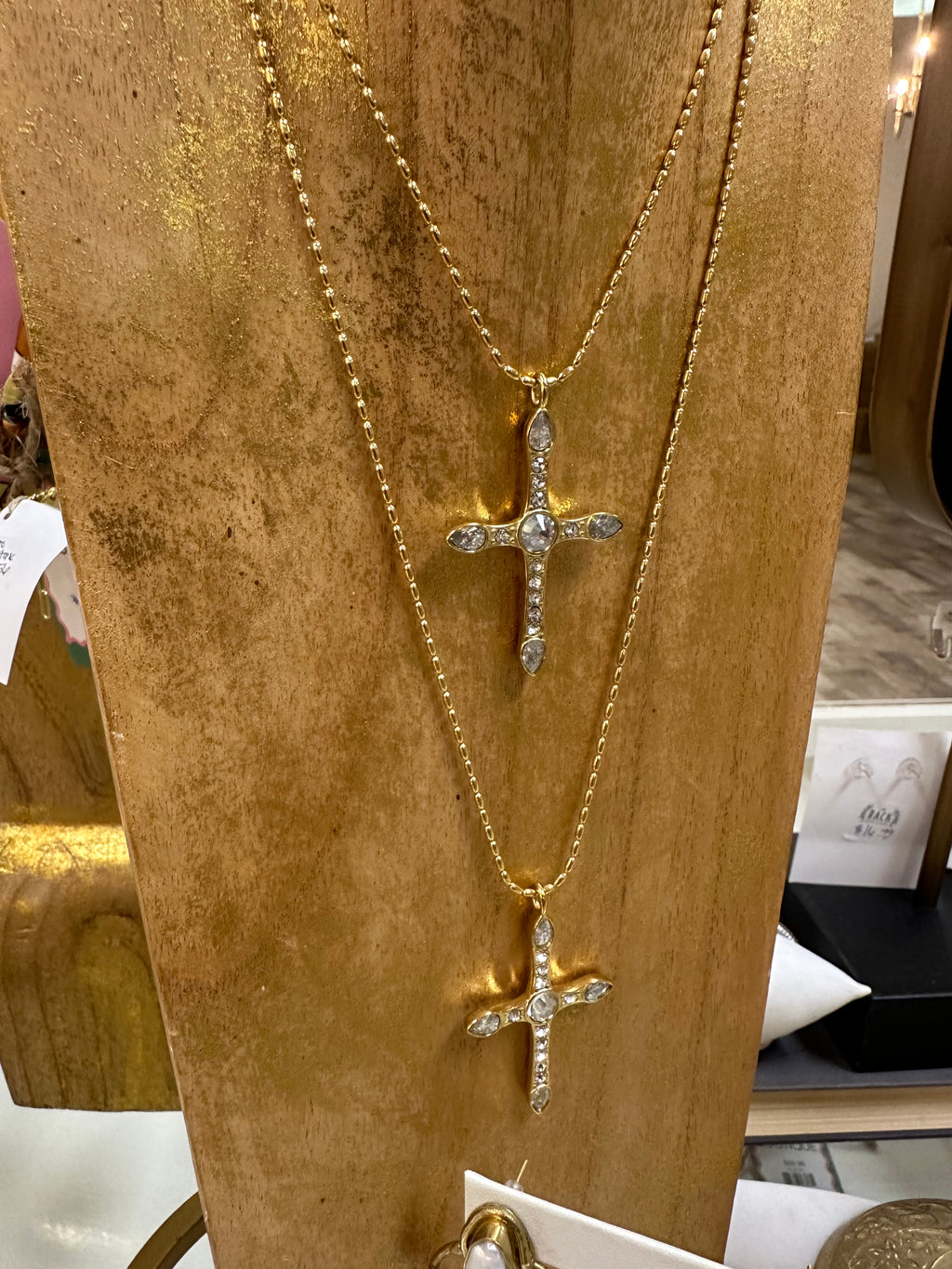 triple play cross necklace