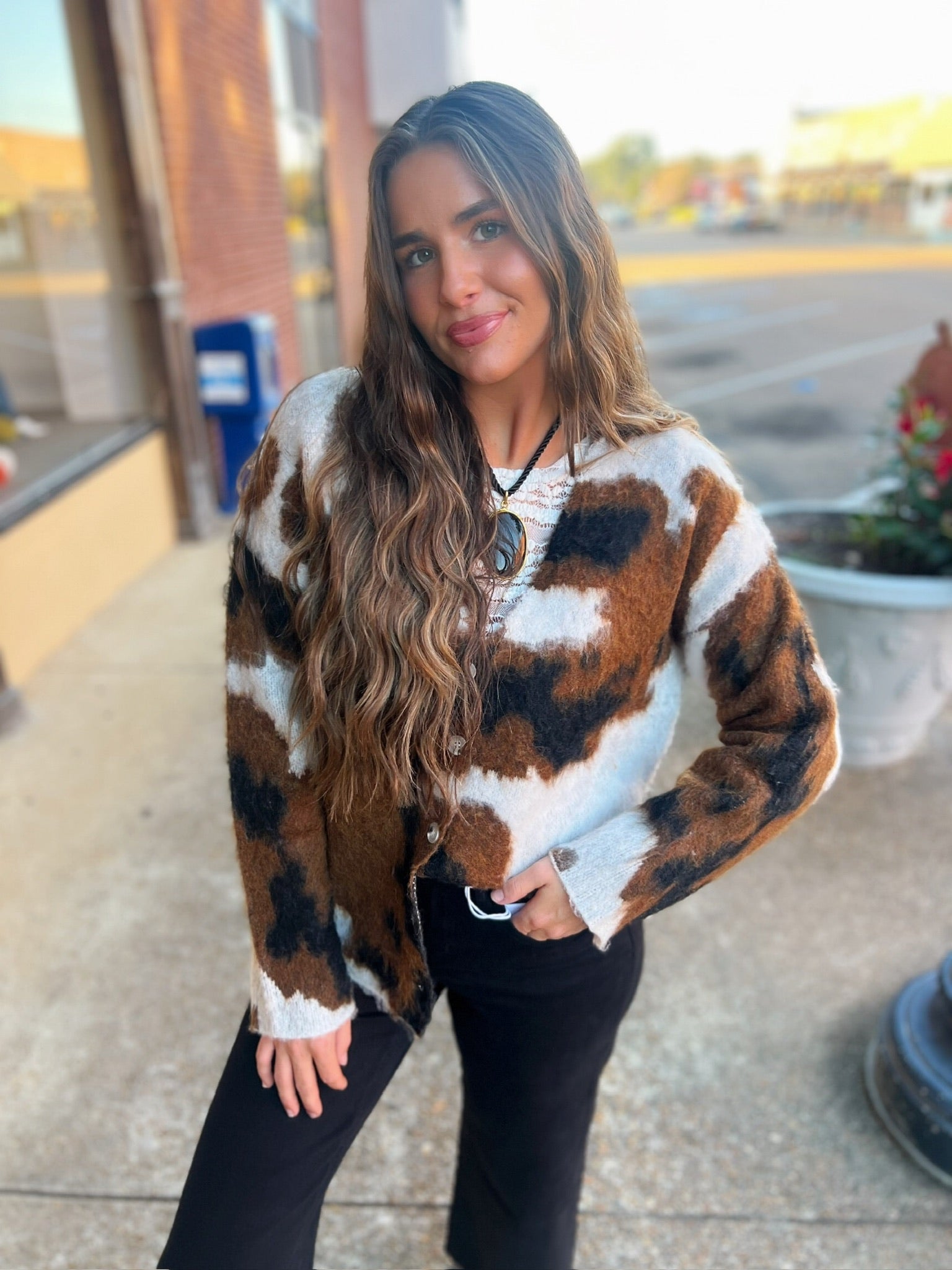 tucker cow print sweater